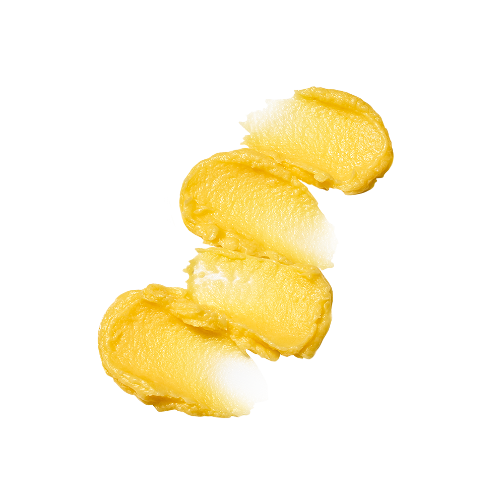 Texture in balsamo con micro-granuli per un gommage viso delicato alla Vitamina C.