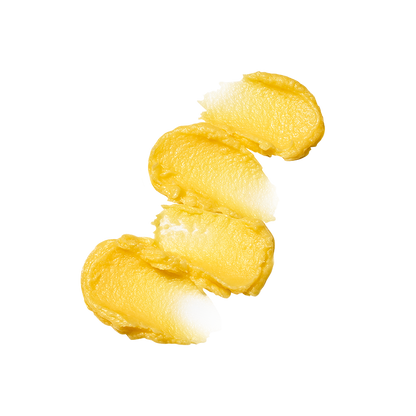 Texture in balsamo con micro-granuli per un gommage viso delicato alla Vitamina C.